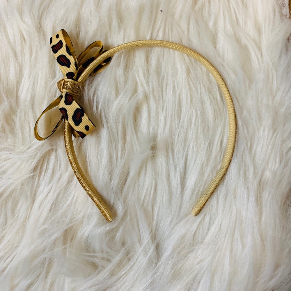 Head band cheetah design and gold glitter of top